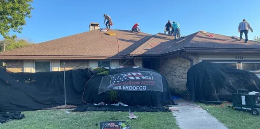 A group of people on top of a roof