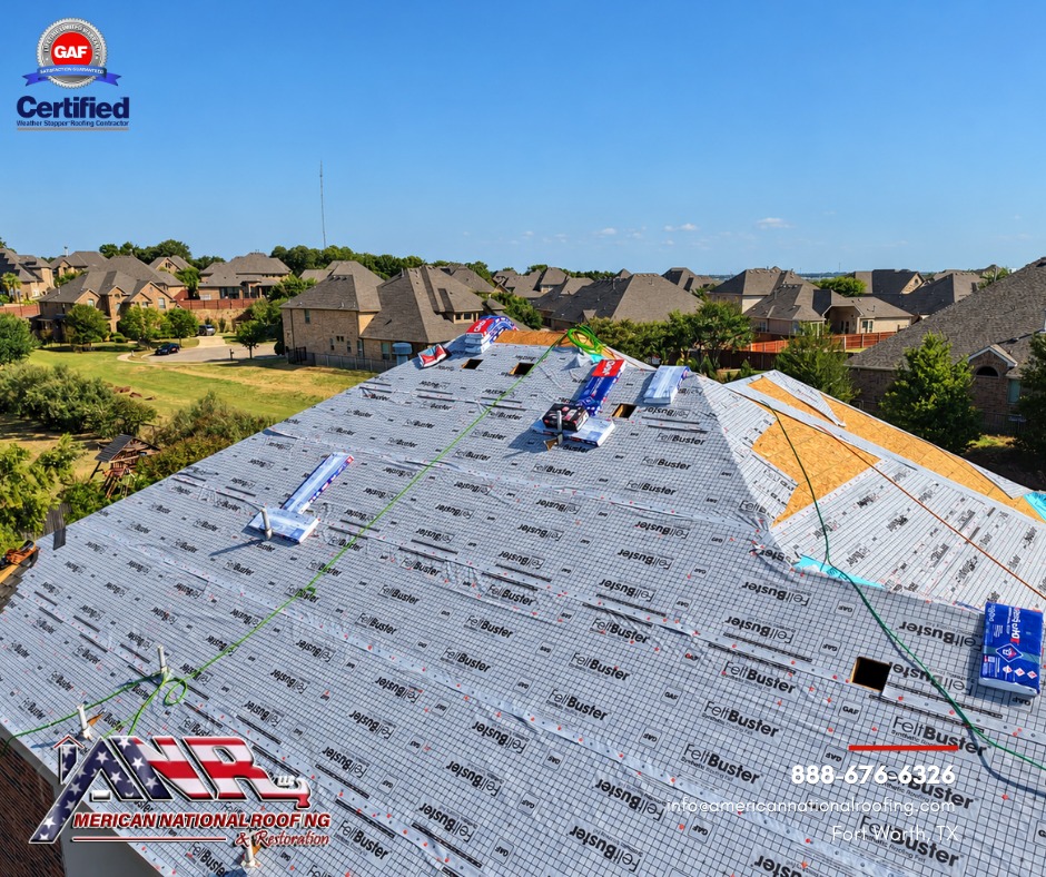 Roof surface showing the synthetic felt underlayment and GAF roofing materials installed.