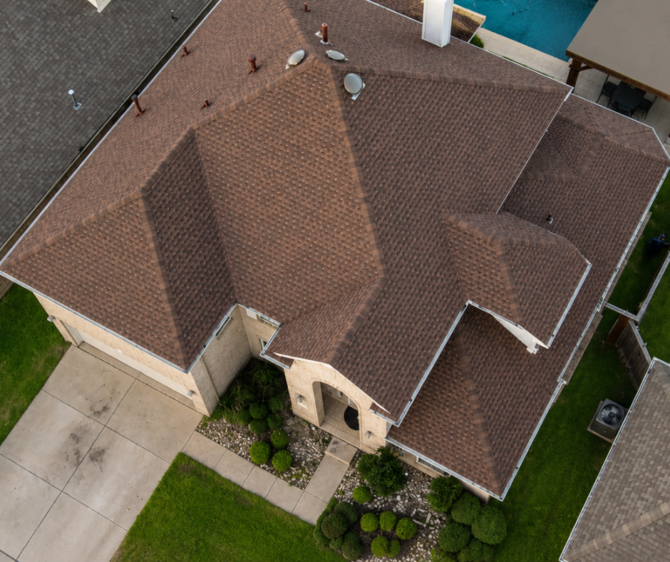 Professional overhead aerial photo of a home showing the full new roof after replacement by American National Roofing